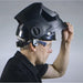 man with 3m speedglas welding helmet installed to hard hat, flipped up