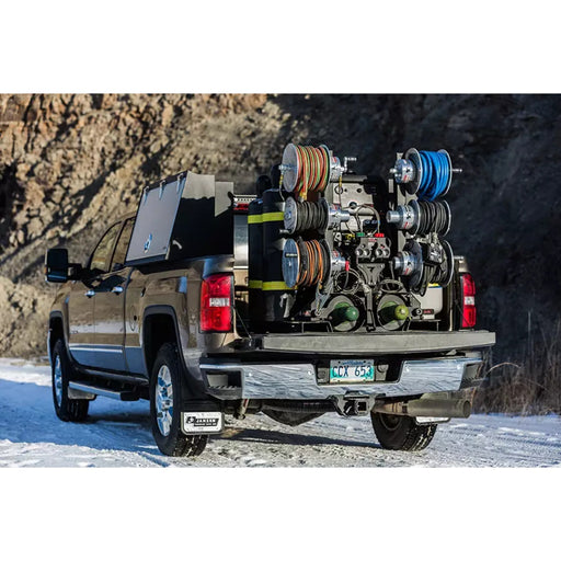 alumareel 3600 mounted in back of pickup rear view