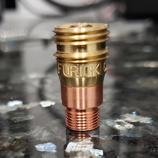 stubby gas lens on table showing furick logo and threads for cups