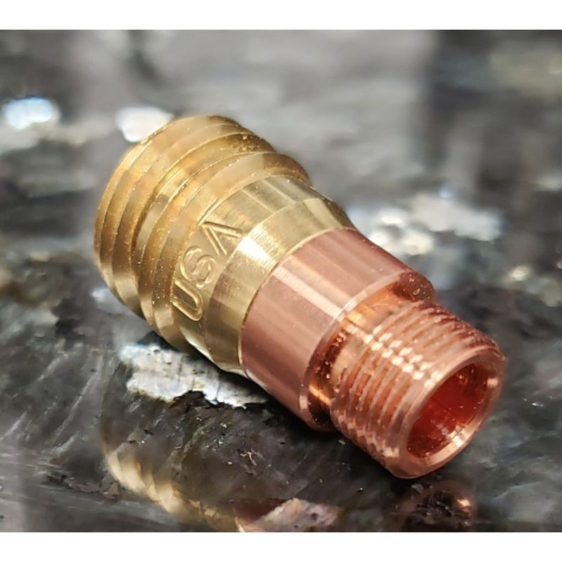 furick stubby gas lens laying on its side to show threads for connecting to 17 tig torch