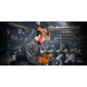 man wearing tecmen hard hat grinding shield holding grinder