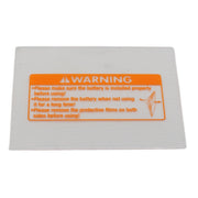 Inner lens for Tecmen welding helmet with warning label attached