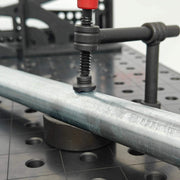 View of 180° Basic Pipe Clamp in use with 16mm welding fixture table