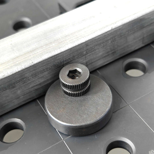 View of Ø 45mm Eccentric Stop in use with a 16mm welding table