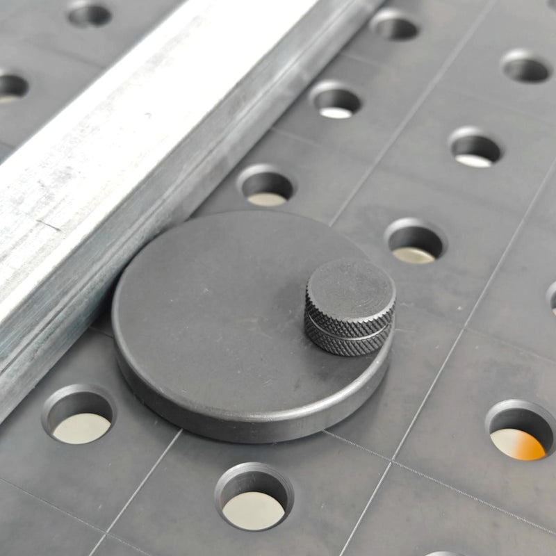View of 75mm Eccentric Stop in use on 16mm welding table
