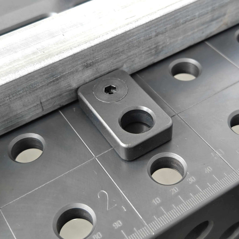 View of 50mm L Universal Stop in use with 16mm welding table