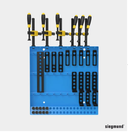System 16 tool wall full of clamps and welding table accessories