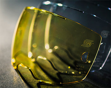 esab sentinel a50 lenses for welding helmet in two colors. amber/yellow and clear