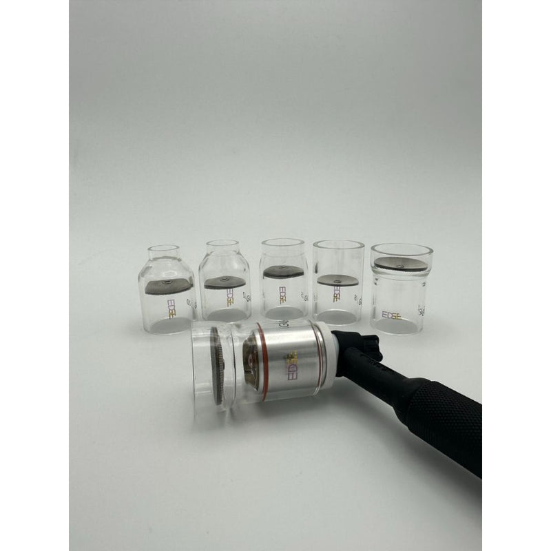 set of 5 large diameter pyrex cups with one installed on a tig torch